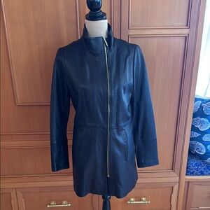 Cole Haan lamb skin coat, size small, excellent condition.